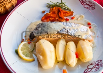 delicious plate of fish and potatoes