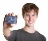 Man Holds Solar Panel