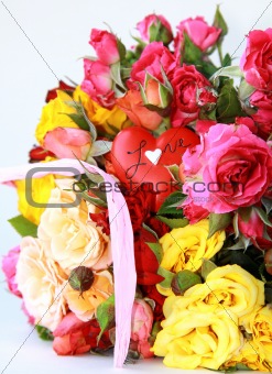 bouquet of multicolored roses, small sprays, with a heart