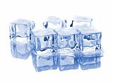 Six ice cubes with reflection