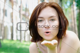 Girl giving a kiss