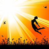 Nature background with silhouette jumping girl
