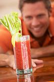 Man Reaching For A Bloody Mary
