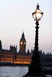 Old-Fashioned Street Lamp With Houses Of Parliament Illuminated 