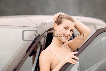 Beautiful Girl Portrait with Her New Vehicle