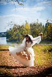 Bride in autumn field