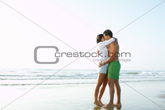 adorable  couple in love kissing and embracing each other