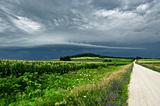 Storm Clouds Over a Country Road