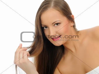 Beautiful spa woman face with long healthy hair and pure skin