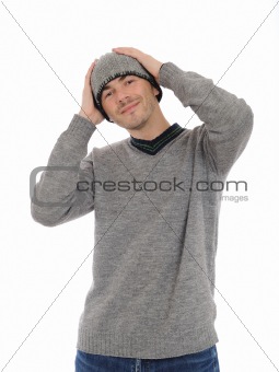 Handsome casual man in winter hat and warm clothes. isolated
