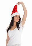 Funny pretty casual santa claus woman with red christmas hat