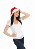 Funny pretty casual santa claus woman with red christmas hat.