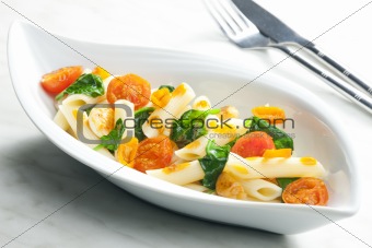 pasta penne with spinach and cherry tomatoes