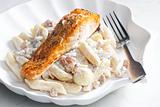 baked salmon on pepper with creamy pasta