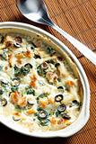 baked gnocchi with salmon, spinach and black olives