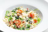 pasta farfalle with Parma ham and cherry tomatoes