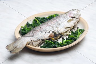 bream baked with Italian herbs and fried spinach
