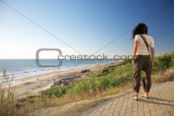 woman watching Roche beach
