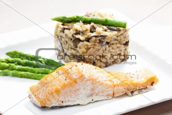 baked salmon with mushroom risotto and green asparagus