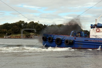 fumes from a river shannon tug boat