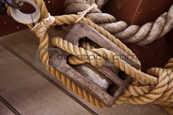 Hessian rope and wooden pulley