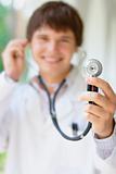 Young doctor holding a stethoscope