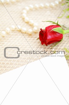 romantic background with rose and pearls