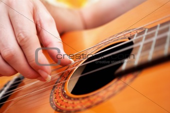 Closeup of a guitarist playing