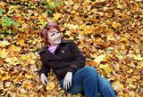 Lady autumn in leaves
