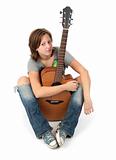 girl playing an acoustic guitar