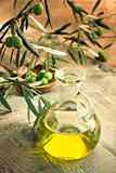 Extra virgin healthy Olive oil with fresh olives