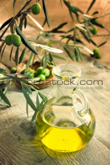 Extra virgin healthy Olive oil with fresh olives
