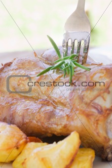 Veal knuckle with potatoes