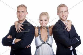young woman in dress standing between two men in suits - isolated on white