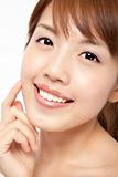Happy beautiful asian woman's face with fresh clean skin