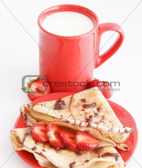 cup of milk and cakes with strawberry