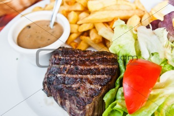 steak beef meat with tomato and french fries 