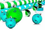 Rolls of gift wrapping paper and ribbon with blue and green christmas baubles