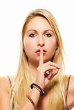 beautiful blonde woman holding finger at her mouth