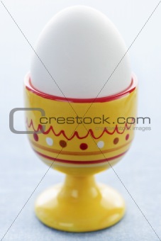 Boiled egg in cup