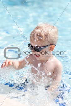 toddler in a pool