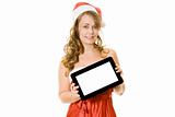 Woman in christmas outfit holding tablet computer