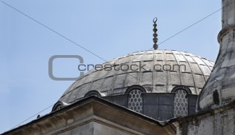 dome of a mosque in a clear blue sky