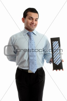 Smiling salesman proudly with a product merchandise