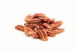 heap of pecan nuts on white background