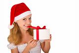 cheerful young girl with Christmas present