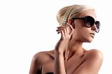 fashion shot of blond woman with sunglasses on