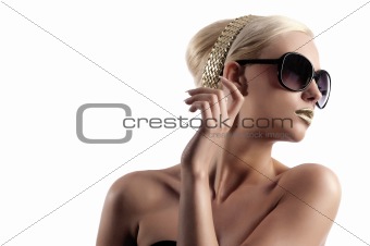 fashion shot of blond woman with sunglasses on