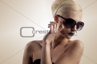 blond girl with sunglasses