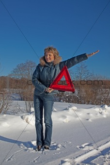 Woman with a warning triangle